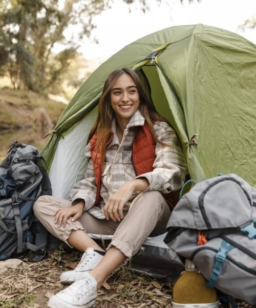 happy-camping-girl-forest-sitting-tent